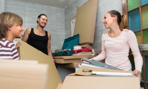 Removal team planning a move in a Tooting residential street