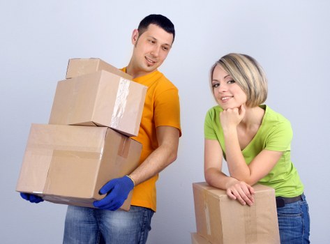 Packed boxes and labelled belongings prepared for house removals in Tooting