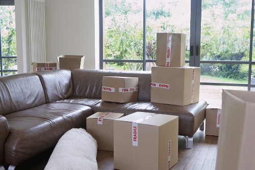 Packed boxes and furniture ready for transport in Tooting